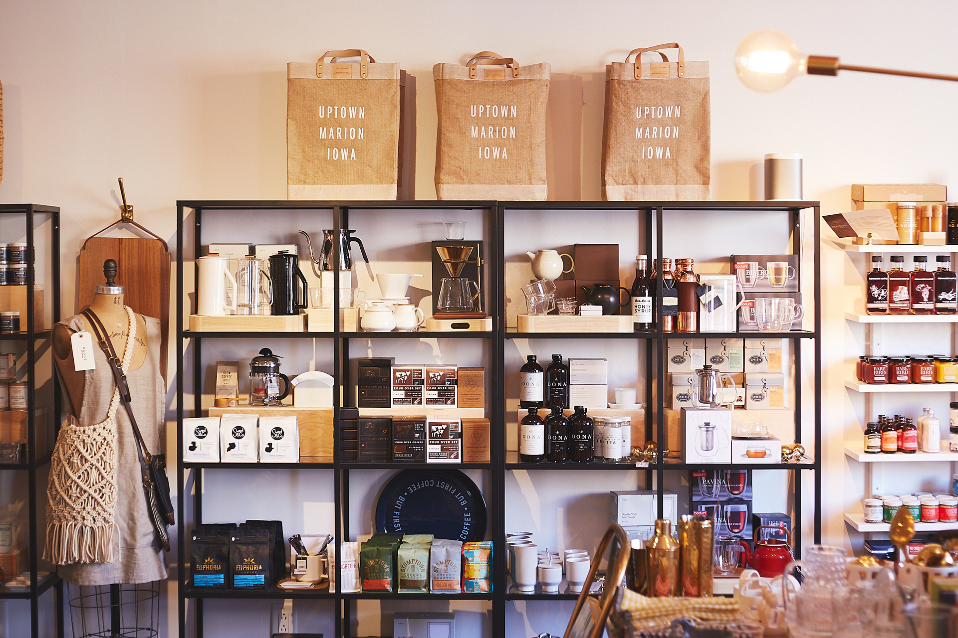 household goods and accessories fill retail display shelves at a boutique store in cedar rapids