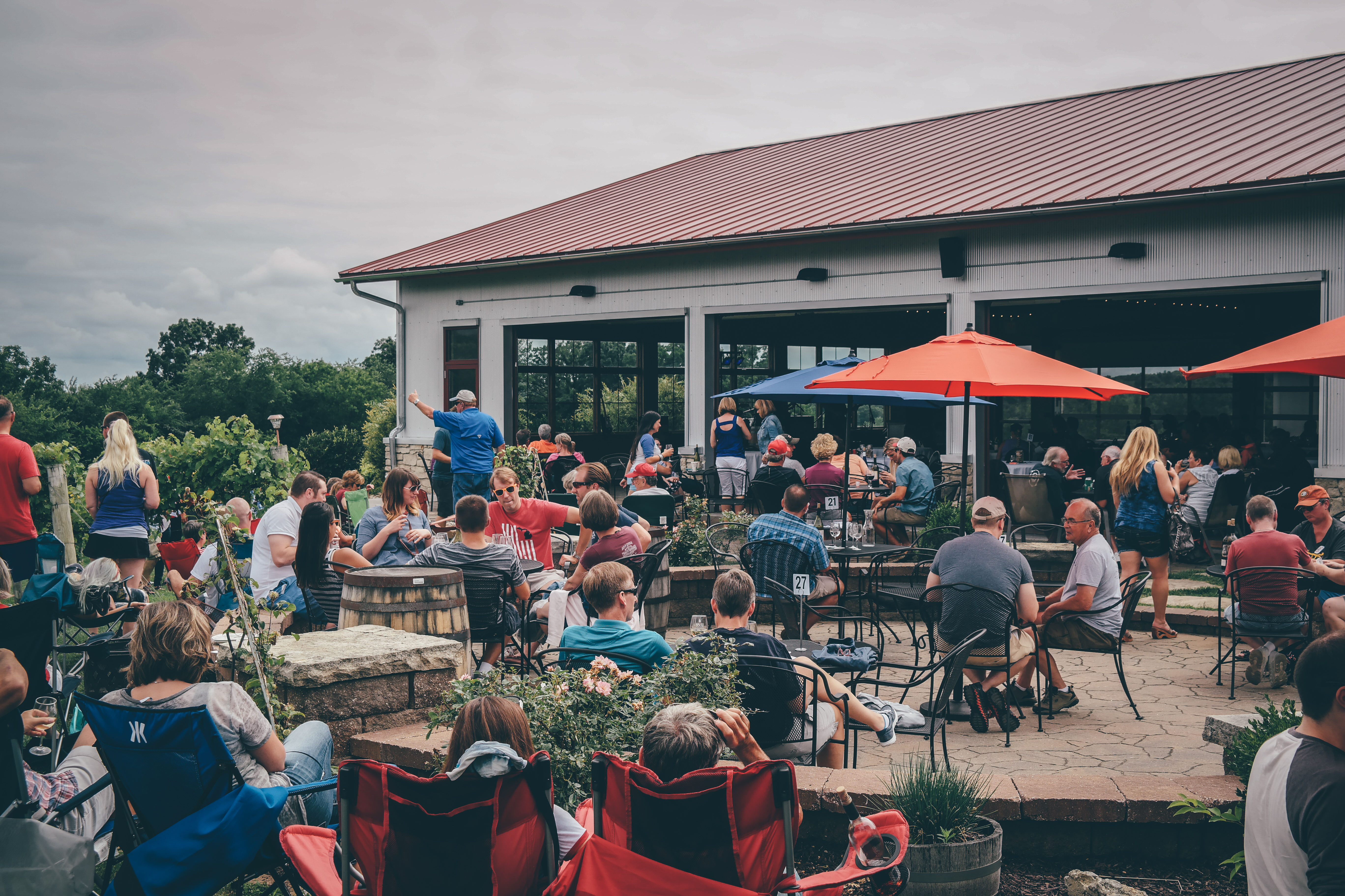 large outdoor gathering on the patio at Cedar Ridge Distillery and Winery